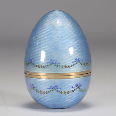 Silver and blue enamel egg decorated with flower garlands