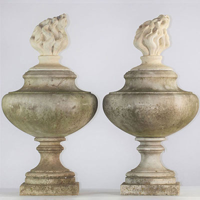 Pair of white marble basins surmounted by flames