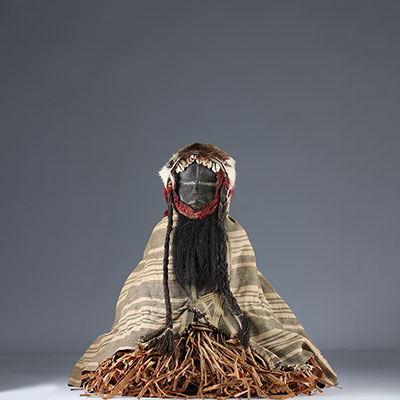 Rare fetish protector of fields with costume.- Dan- Ivory Coast- Mid 20th century. Ex Budrose coll. USA.