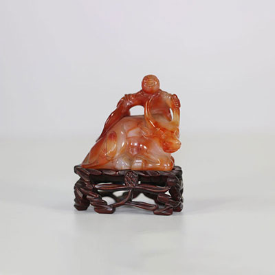 Child agate statuette on a buffalo, China Qing period.