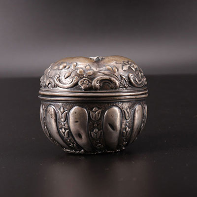 Silver box in the shape of a punched fruit 82