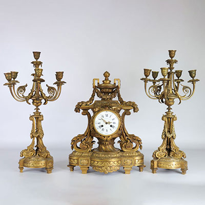 Imposing pendulum and candelabra set in gilded bronze signed Barbedienne.