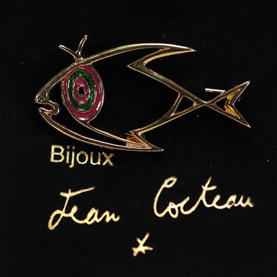 Jean Cocteau. Fish. Brooch in gold metal and email. Signed 