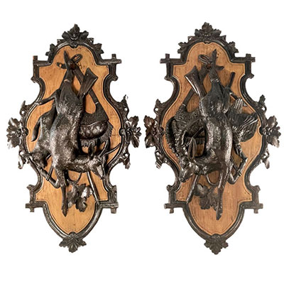 Imposing black forest pair of 19th century carved wooden trophies