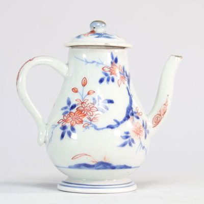 Chinese porcelain teapot with blue and red/orange flowers