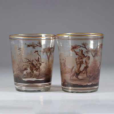 Old glassworks painted with hunting scenes