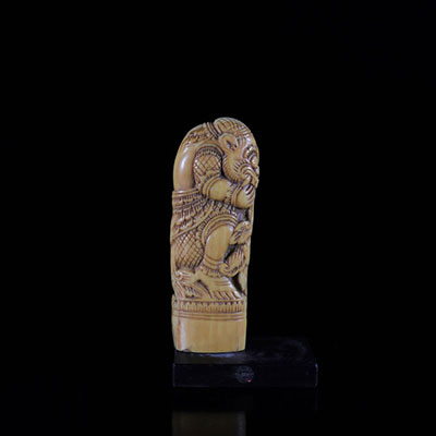 Asia finely carved ivory knife handle of a 19th century deity