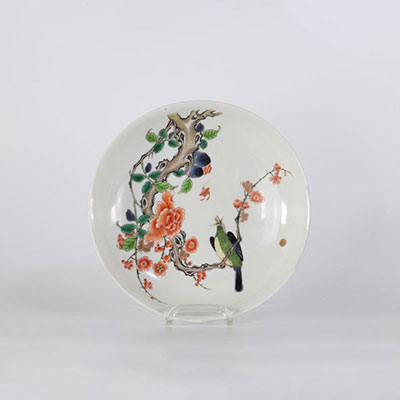 Assiette en porcelaine de chine Kangxi à décor d'un oiseau branché (restauraton)