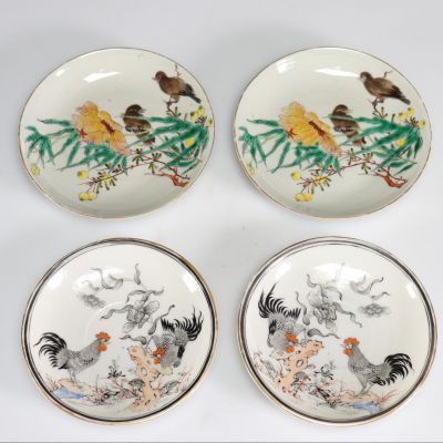 Assiettes (4) en porcelaines, décor oiseaux