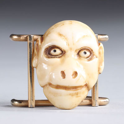 Netsuke carved - a monkey mask, Japan Meiji period 19th signature