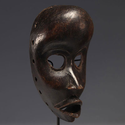 DAN mask, Ivory Coast, hardwood with dark patina