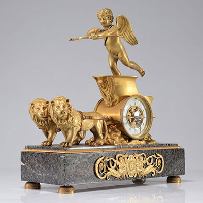 Pendulum with chariots pulled by lions in gilt bronze and finely chiseled fire gilding