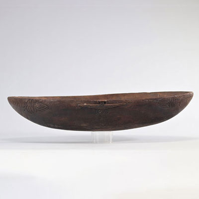 Carved wooden food bowl originating from Oceania