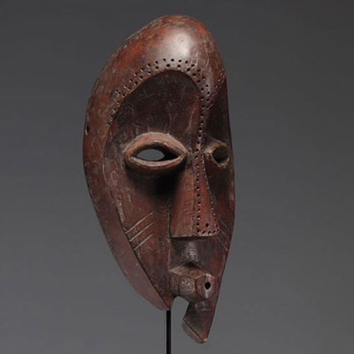 MAHONGWE, wooden face mask, punched face contour.