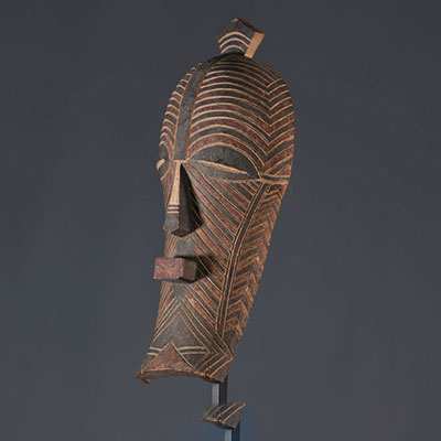 Black and red polychrome kifwebe hut mask circa 1930, with typical Luba Songye features