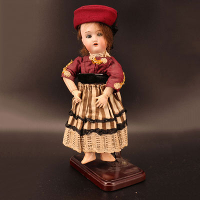 Open mouth porcelain head doll
