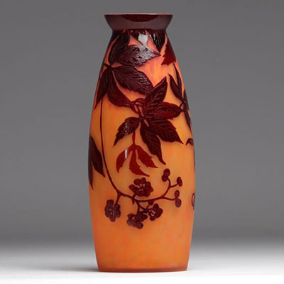 Degué multi-layered vase decorated with berries on an orange background