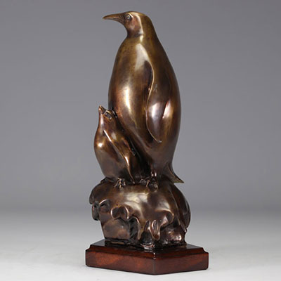 Penguin in bronze on a wooden base
