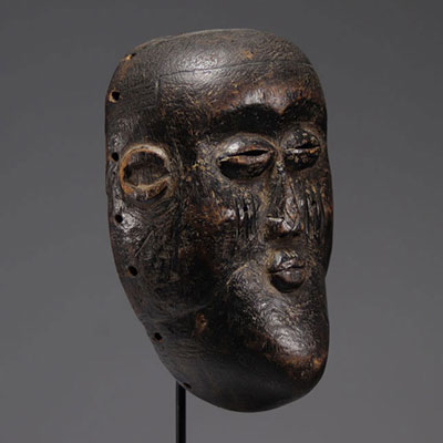 Carved wooden mask