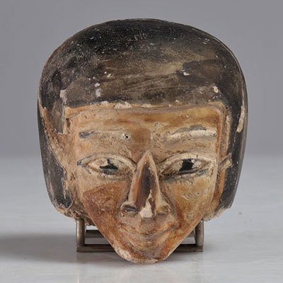 Polychromed stone head (fragment) Egypt probably Late Period