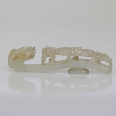 White jade fibula carved with a Qing period dragon and chilon