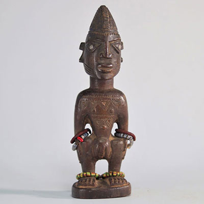 Ibeji yoruba statue carved wood scarified body