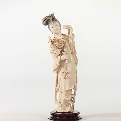 China sculpture of a young woman with an inlay flower