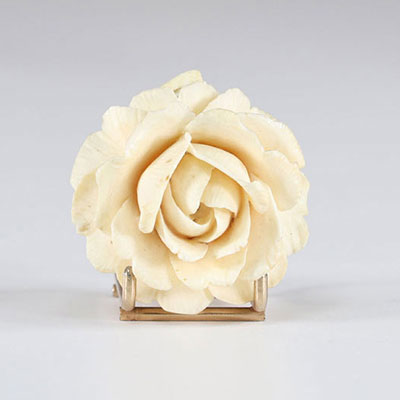 Ivory pendant carved with a rose circa 1900